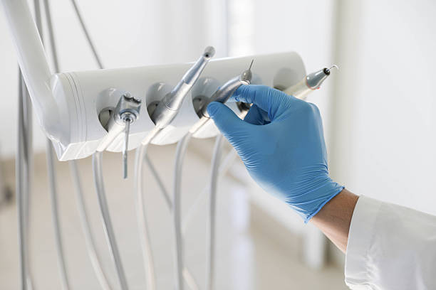Professional Root Canal Treatment technician working in Moorhead, MS